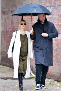 Pregnant Jennifer Lawrence Puts Her Cool Girl Maternity Style on Display During Rainy Day Outing with Husband Cooke Maroney