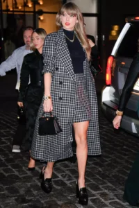 Taylor Swift Rocks Plaid Coat, Matching Mini and a Twist on Her Signature Lip for Girls' Night in NYC