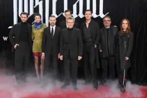 Emma Corrin Stands Out in Sheer Dress While Nosferatu Costars Wear All-Black