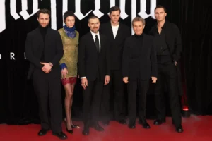 Emma Corrin Stands Out in Sheer Dress While Nosferatu Costars Wear All-Black